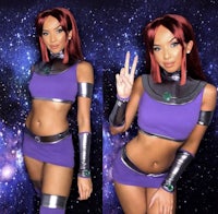 a woman in a purple costume posing for a photo