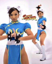 a woman in a street fighter costume posing for a photo