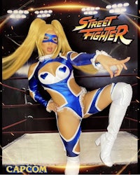 a woman in a street fighter costume posing for a photo