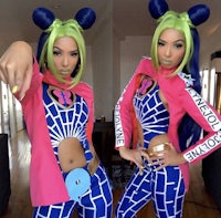 a woman in a blue and green costume posing for a picture